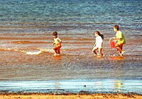Dunes Beach House - playing at the beach